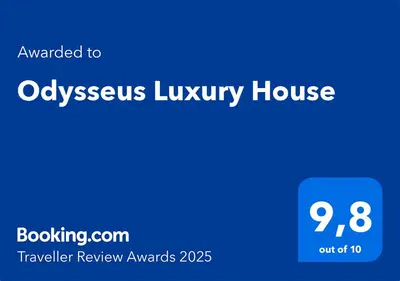 a blue sign with the words odysseus luxury house at Odysseus Luxury House in Rhodes Town