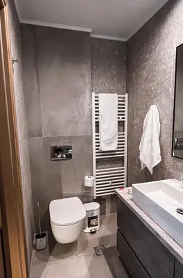 a bathroom with a toilet and a sink at Wohlfühloase 1 Casa Elena und Gerd in Rhodes Town