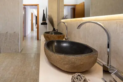 a bathroom with two sinks on a counter at El Paradiso in Pastida