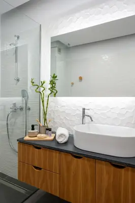 a bathroom with a sink and a shower at Aquarama Pool Apts. in Ixia
