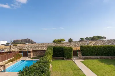 a house with a swimming pool and a yard at Lindos Aeonian Villas in Líndos