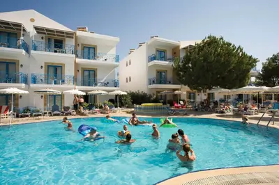 a group of people in the swimming pool at a hotel at Pefki Islands in Pefki Rhodes