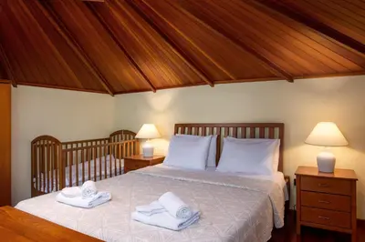 a bedroom with a bed with towels on it at Suite del Capitano in Rhodes Town