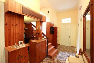a large room with stairs and a stair case at Hotel Anastasia in Rhodes Town