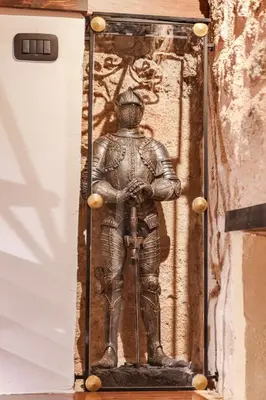 a statue of a man in armour on a wall at Medieval apartment Estiva in Rhodes Town