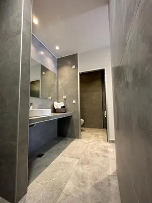 a bathroom with a sink and a mirror at Nirea studio in Faliraki Rhodes in Faliraki