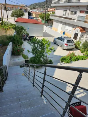 a view from the balcony of a parking lot at Tina's Studio in Pastida