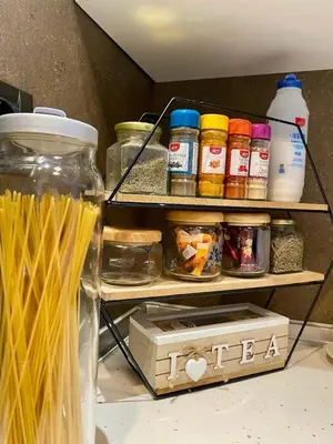 a shelf in a refrigerator filled with lots of food at John's house in Rhodes Town