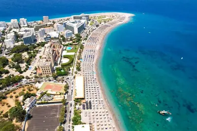 an aerial view of a beach with buildings and the ocean at Fani's City Apartment in Rhodes Town