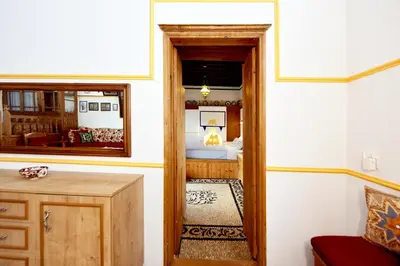 a room with a door leading to a bedroom at Villa Annoula - Traditional Lindian House in Líndos