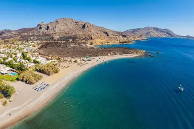 an aerial view of a beach and the ocean at La Casa Di Pietre 1 in Kiotari