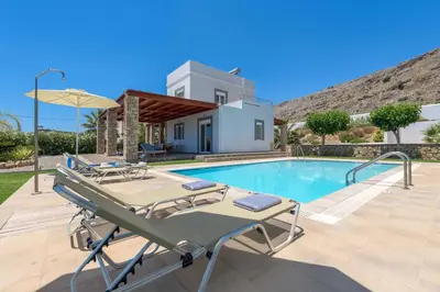 an image of a villa with a swimming pool at Villa Ariadne Lindos in Pefki Rhodes