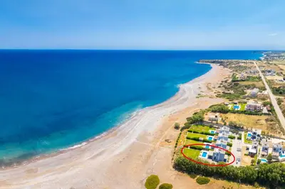 an aerial view of a beach with condos at Villa Lahania in Lachania