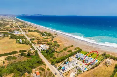 an aerial view of a roller coaster on the beach at Villa Metis in Lachania