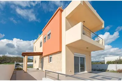 a house with an orange and white at Villa Verona Pool in Lachania