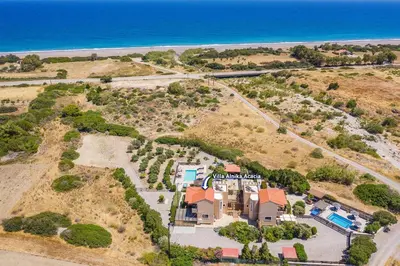 an aerial view of a house on the beach at Villa Alnika Acacia by Villa Plus in Lachania