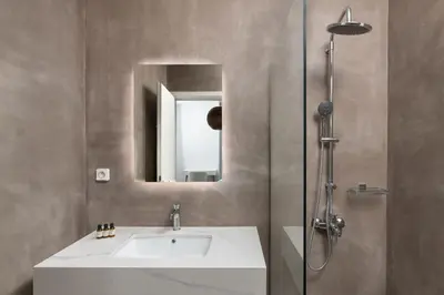 a bathroom with a sink and a mirror at Sunset Hill Villa Rhodes in Gennadi