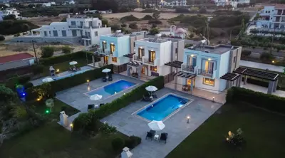 an aerial view of a house with a swimming pool at Petra Villas in Gennadi