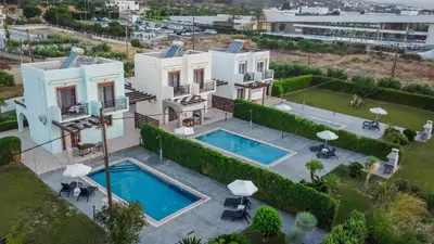 an aerial view of a villa with a swimming pool at Petra Villas in Gennadi