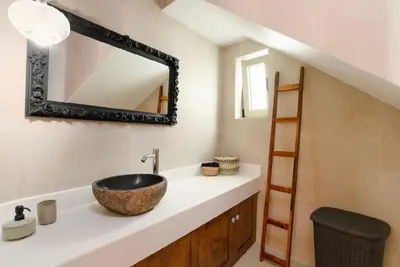 a bathroom with a sink and a mirror at 5 SENSES in Pefki Rhodes