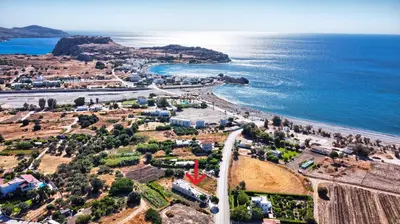 an aerial view of a beach and the ocean at Merelia Luxury Guesthouse in Haraki
