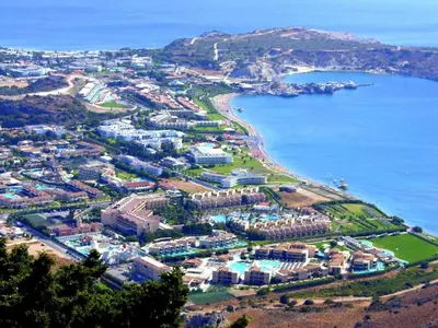 an aerial view of a resort next to a body of water at Summer holidays in Kolimbia