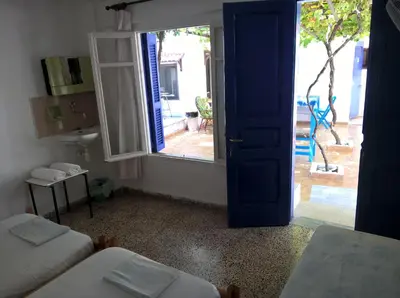 a room with a door open to a patio at Stathis in Rhodes Town