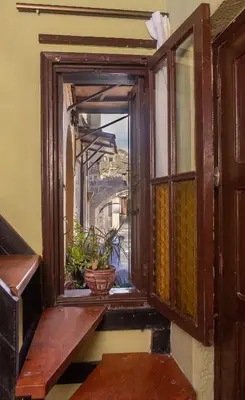an open window with a view of a balcony at Studio Astero in Rhodes Town