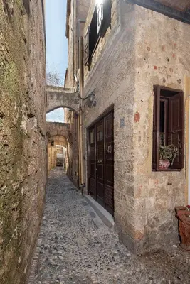 an alley way in an old stone building at Studio Astero in Rhodes Town