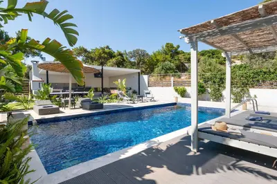 an image of a swimming pool in a villa at Hideaway Villa in Triánta