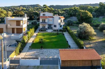 an aerial view of a house with a yard at Hideaway Villa in Triánta