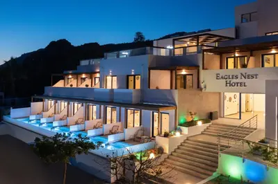 a view of the eolis nest hotel at night at Eagles Nest in Pefki Rhodes