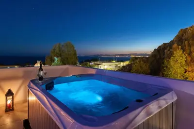 a hot tub on the roof of a house at Eagles Nest in Pefki Rhodes