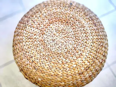a large wicker basket sitting on a tile floor at Villa Libre Mare, your cozy vacation villa in Pefki Rhodes