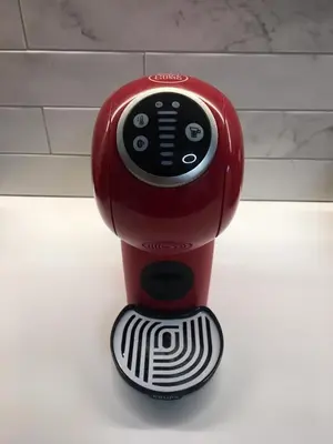 a red toaster sitting on top of a table at Uni cozy city apartment in Rhodes Town