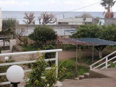 a view of the ocean from the balcony of a house at Antouan Matina in Archangelos