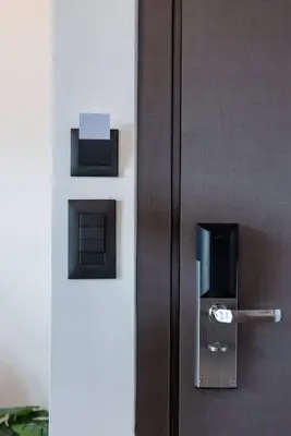 a wooden door with a box on it at Smart Luxury Apartments #2 in Rhodes Town