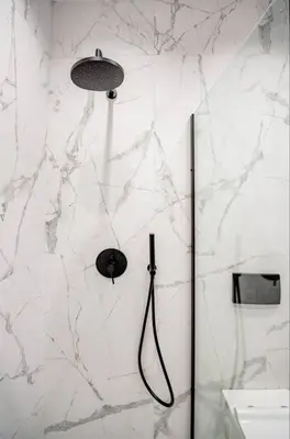 a bathroom with a shower with a shower head at Rhodes Center Luxury Apartments #1 in Rhodes Town