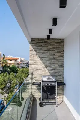 a balcony with a grill on the side of a building at Smart Luxury Apartments #3 in Rhodes Town