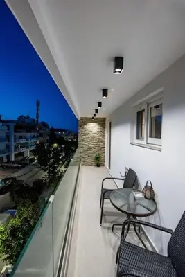 a balcony with chairs and a table on a building at Smart Luxury Apartments #3 in Rhodes Town