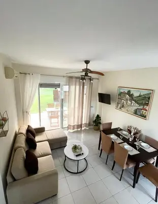 a living room with a couch and a table at Marilia relaxing home, Afantou in Afantou