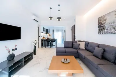 a living room with a couch and a table at Rhodes Center Luxury Apartments #2 in Rhodes Town