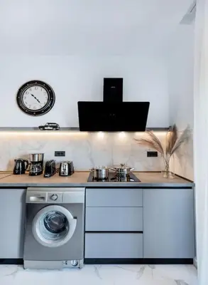 a kitchen with a stove and a washing machine at Rhodes Center Luxury Apartments #2 in Rhodes Town