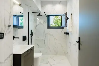 a bathroom with a sink and a toilet and a shower at Rhodes Center Luxury Apartments #2 in Rhodes Town
