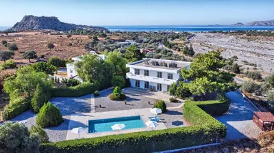 an aerial view of a house with a swimming pool at Grande View Haraki in Haraki