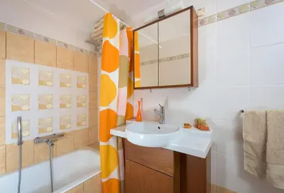 a bathroom with a sink and a bath tub at Cristelia seafront & pool villa in Lachania