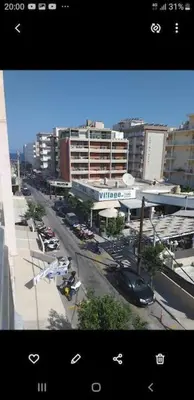 a view of a city street with cars and buildings at Anerades city center apartment in Rhodes Town