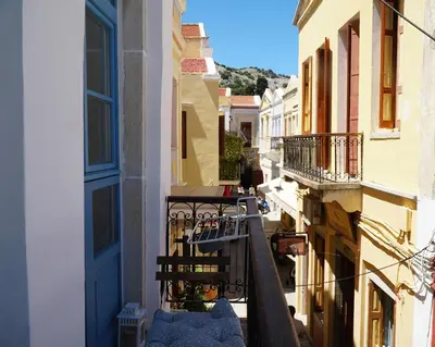 a view of a balcony of a building at Little Gem Symi Boutique Studio in Symi