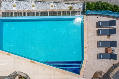 an overhead view of a swimming pool at Villa Karma Lindos in Líndos