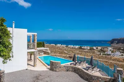 a swimming pool with a view of the ocean at Villa Karma Lindos in Líndos